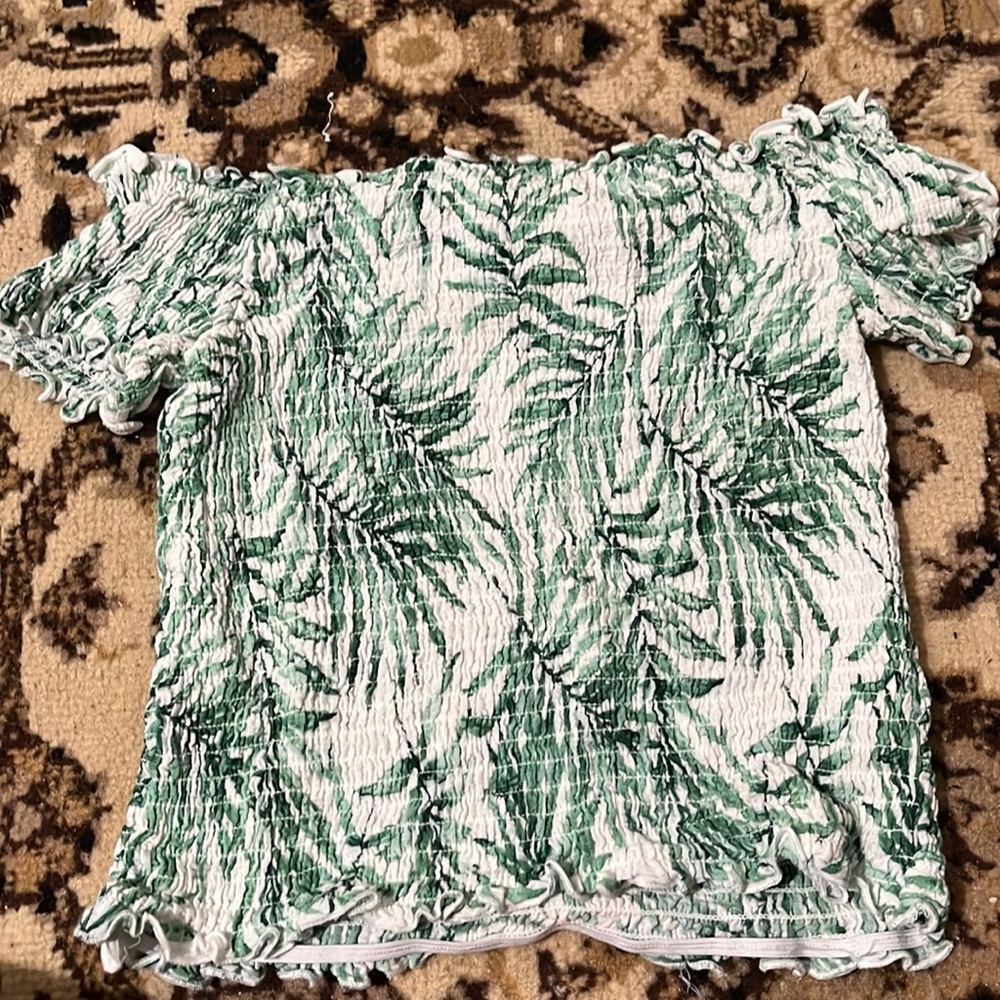 White shoulder with green leafs forever 21 shirt.